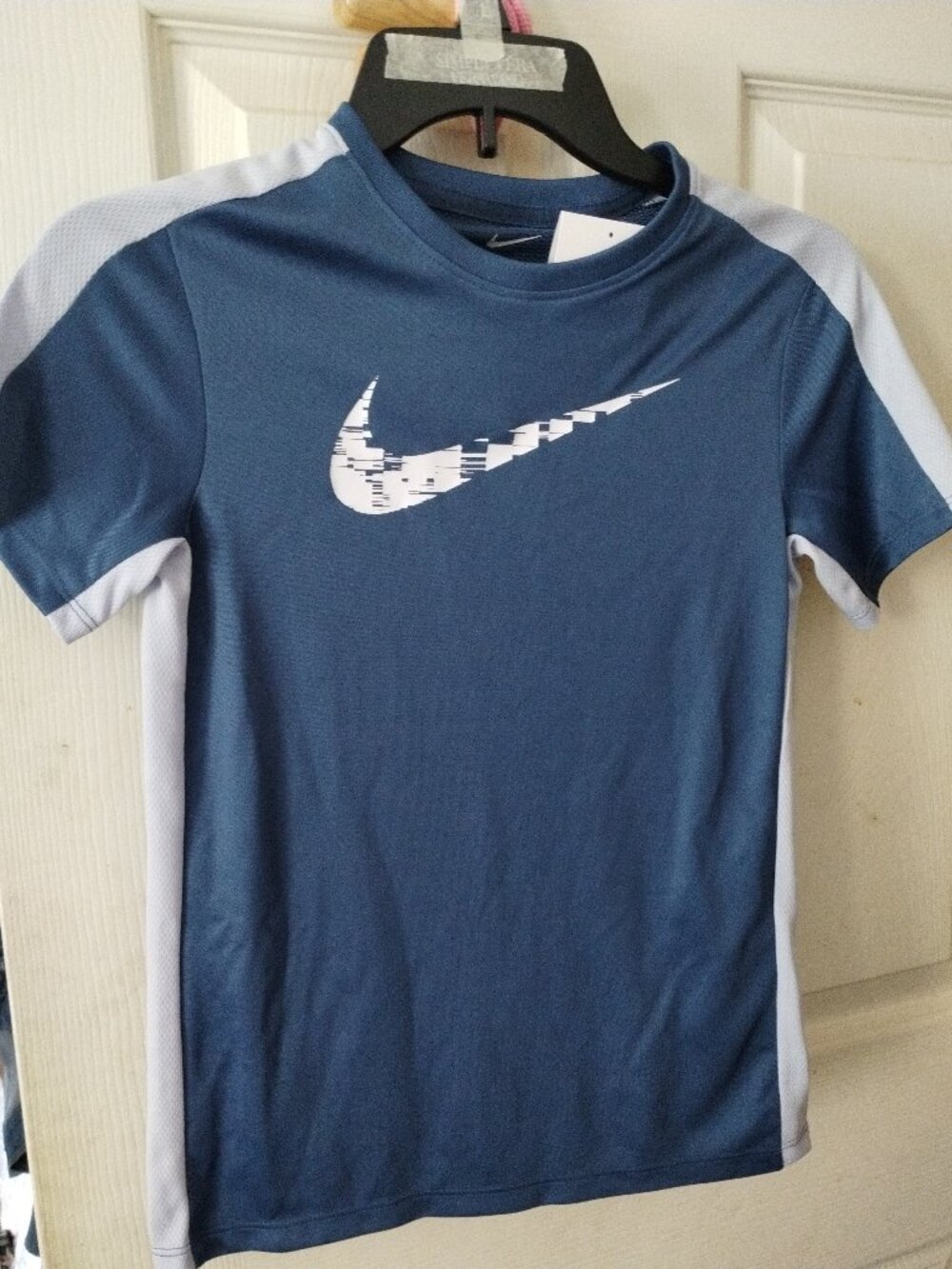 Nike boy's blue polo shirt